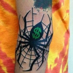 Паук, паутина и знак доллара  на предплечье (на руке)
