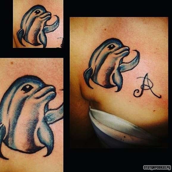 Фотография татуировки под названием «Дельфин и буква А»