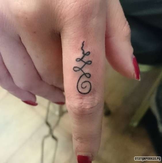 Фотография татуировки под названием «Узор в виде спирали»
