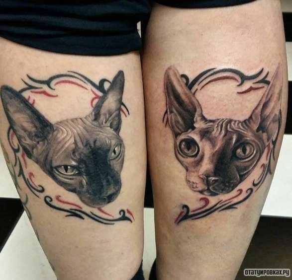 Фотография татуировки под названием «Два сфинкса в сердечке»