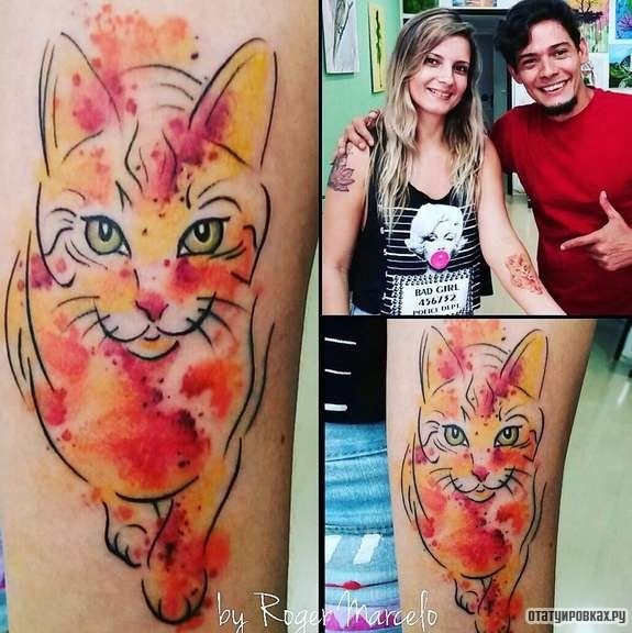 Фотография татуировки под названием «Кошка с зелеными глазами»