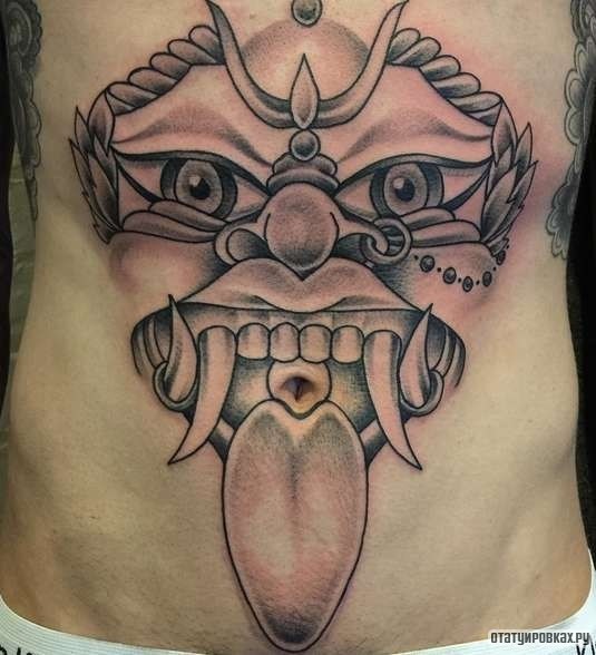 Фотография татуировки под названием «Лик майя»