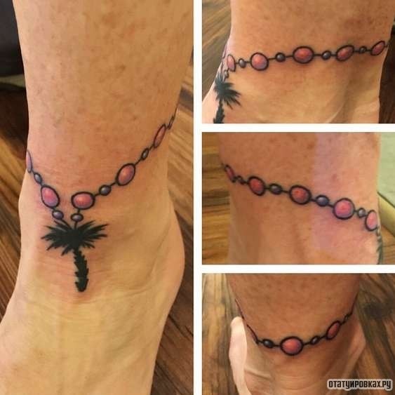 Фотография татуировки под названием «Оберег - пальма на цепочке»