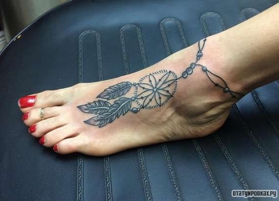 Фотография татуировки под названием «Ловец снов в виде узора цветка»
