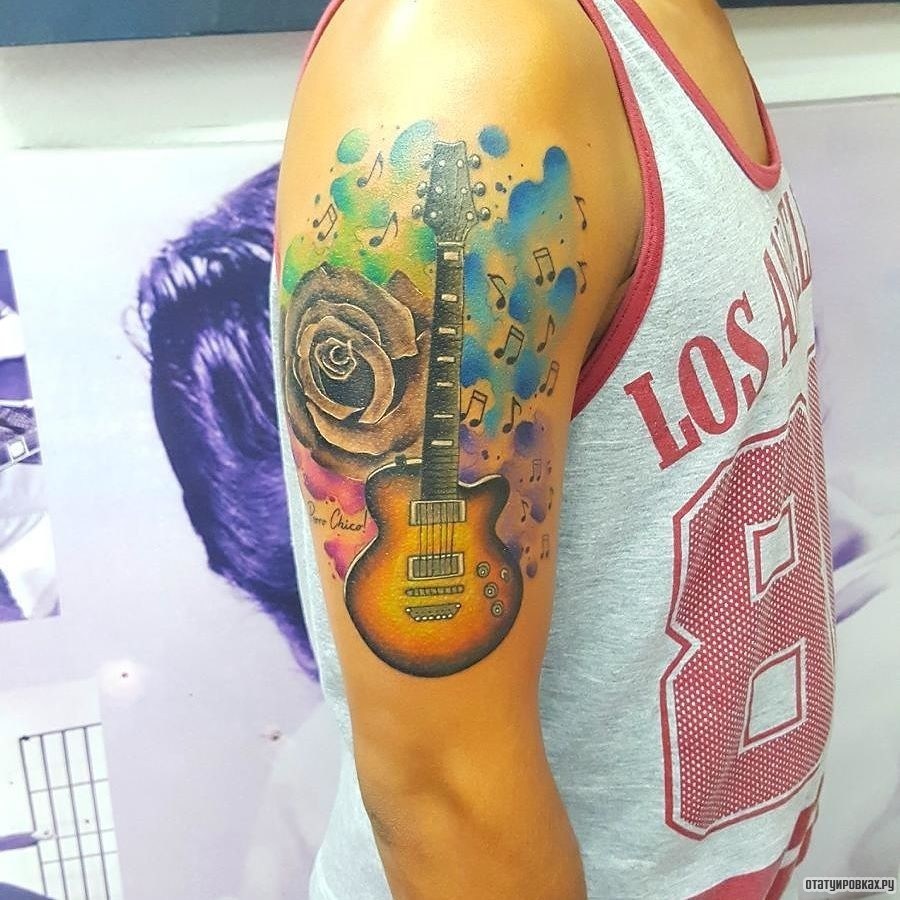 Фотография татуировки под названием «Гитара с розой в красках»
