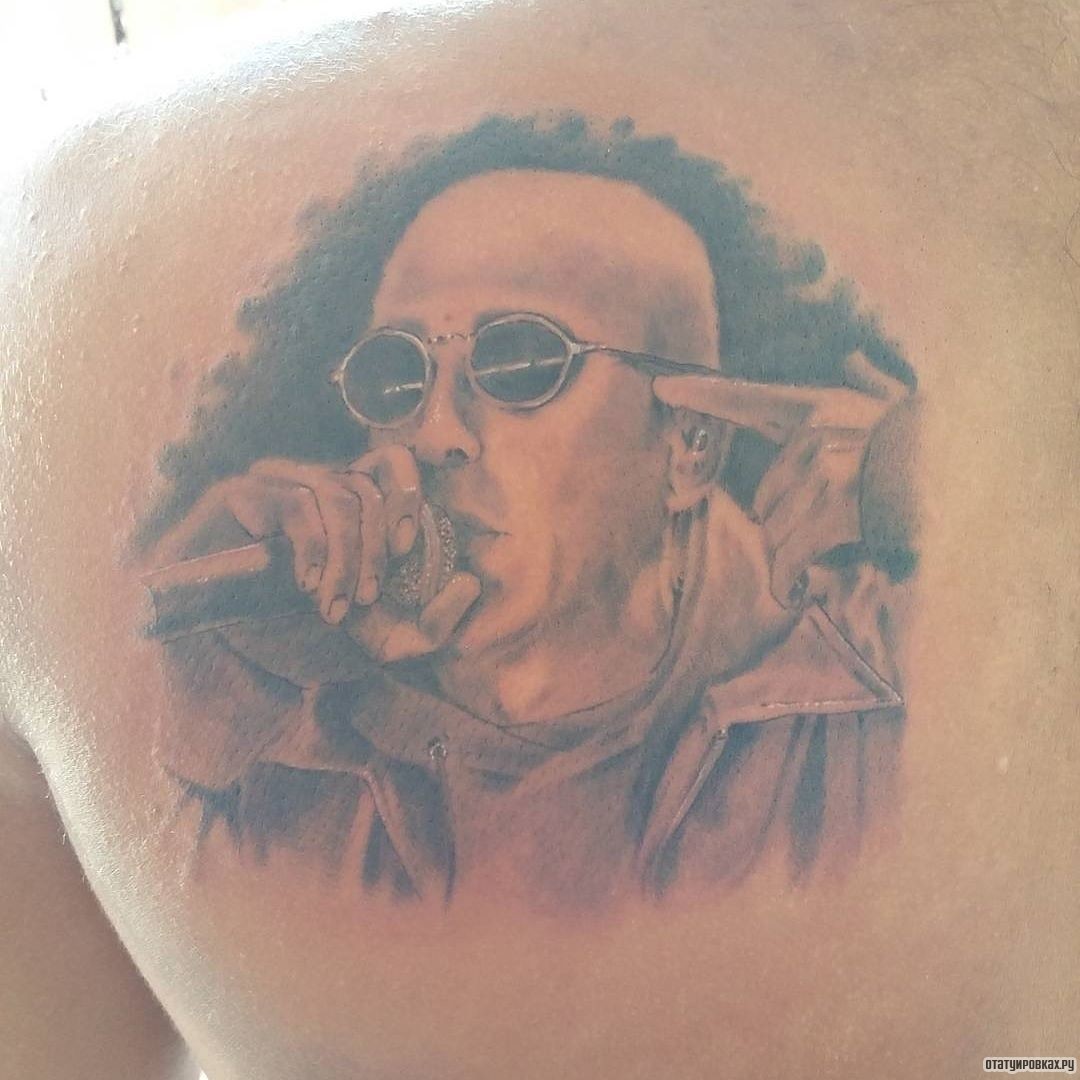 Фотография татуировки под названием «Рок музыкант - портрет»