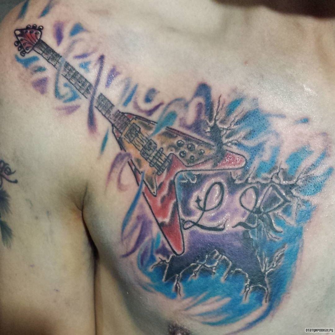 Фотография татуировки под названием «Гитара в с красками»