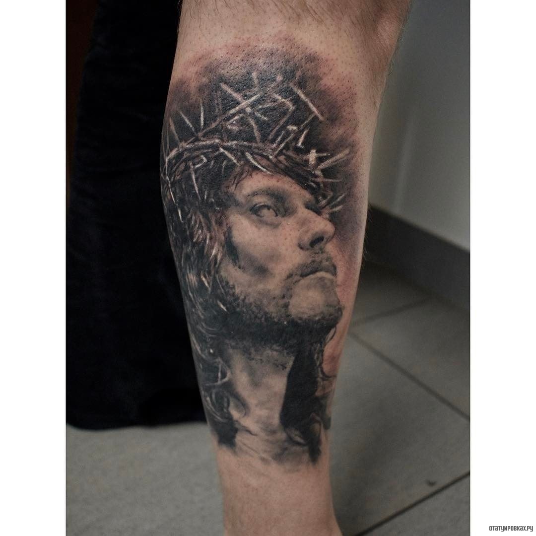 Фотография татуировки под названием «Иисус с белыми глазами»