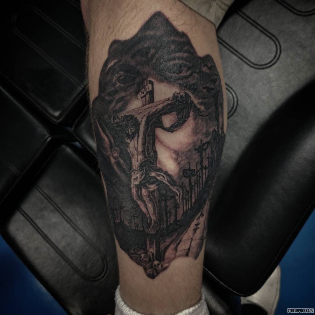 Фотография татуировки под названием «Лицо Иисуса из креста»