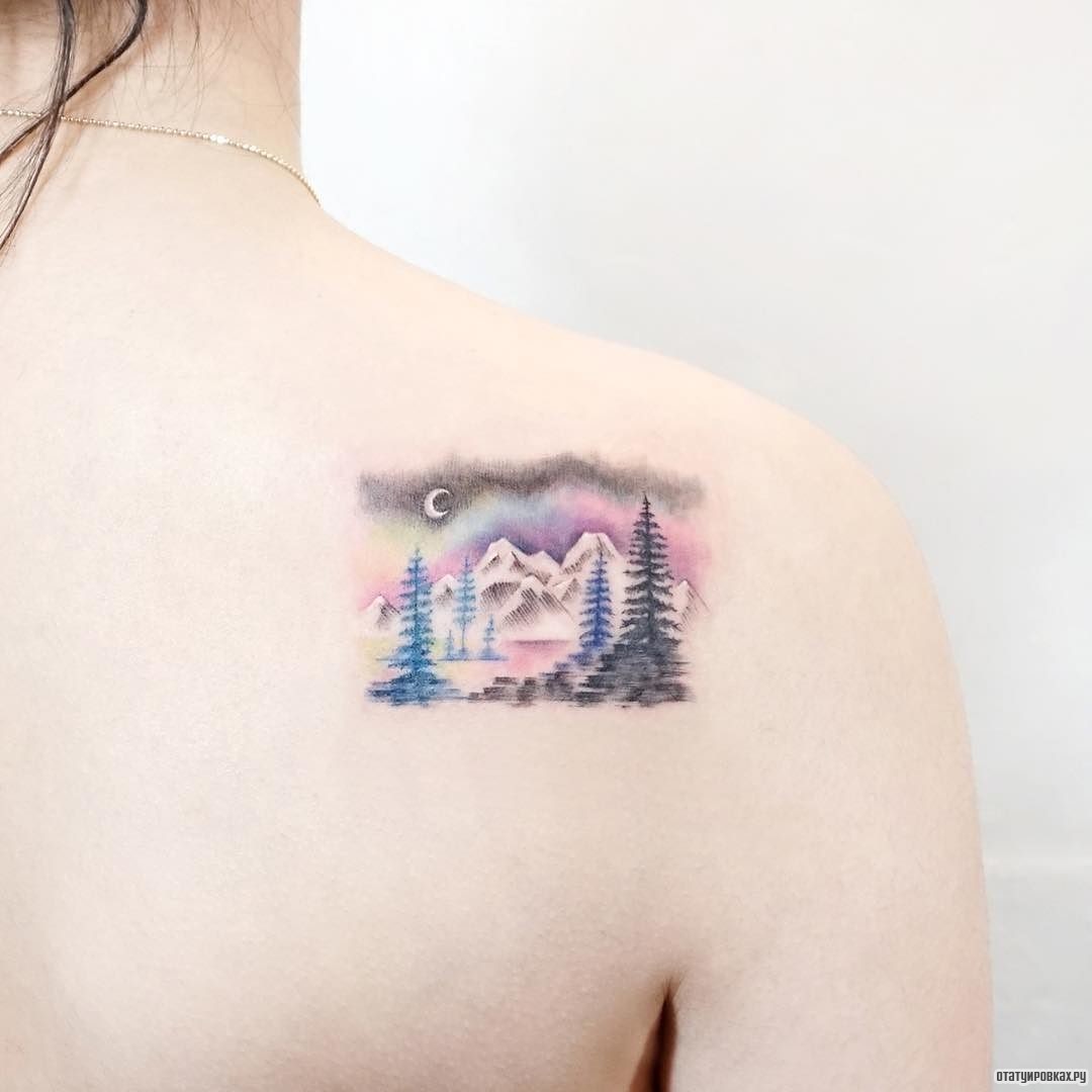 Фотография татуировки под названием «Горы с разноцветным закатом»