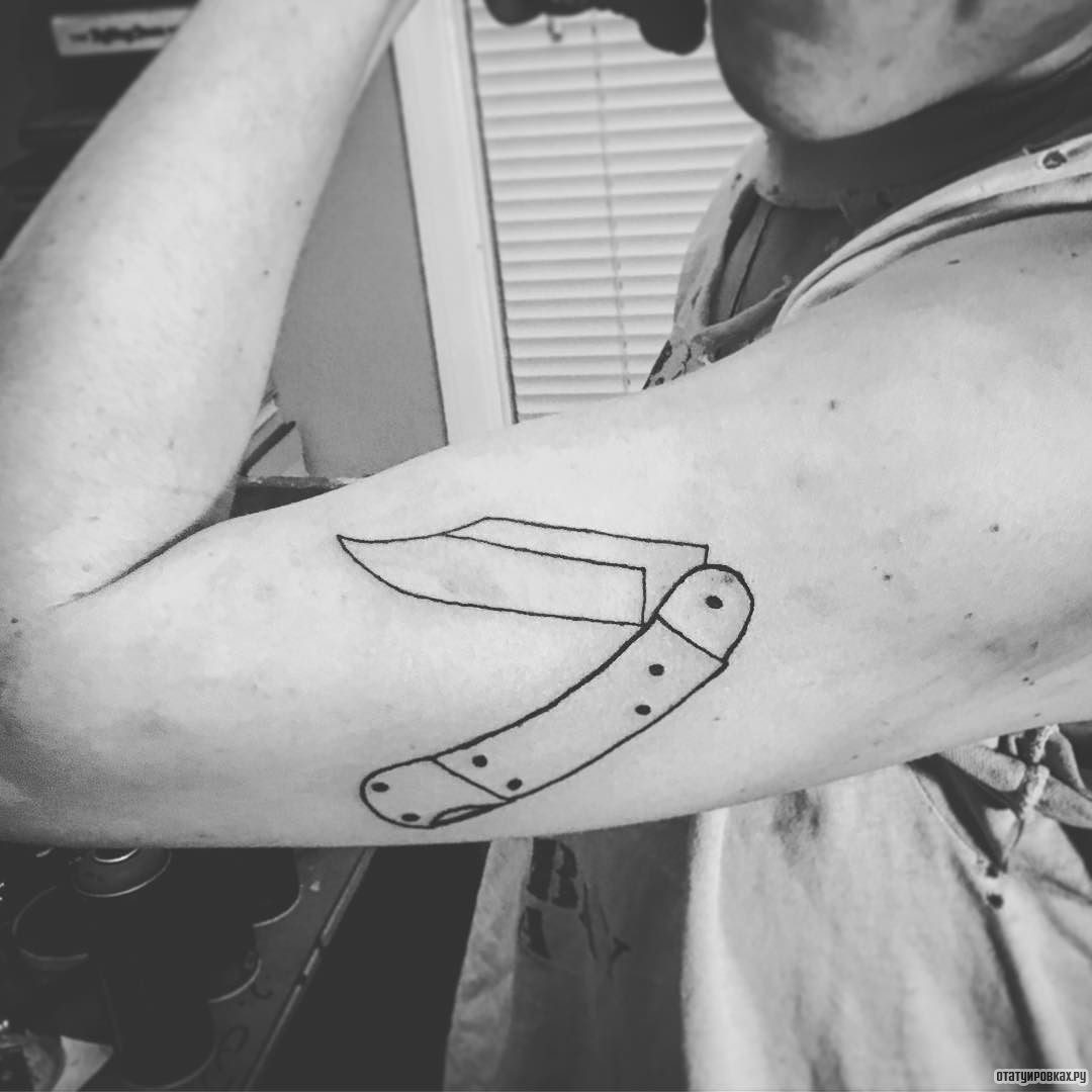 Фотография татуировки под названием «Нож раскладной»