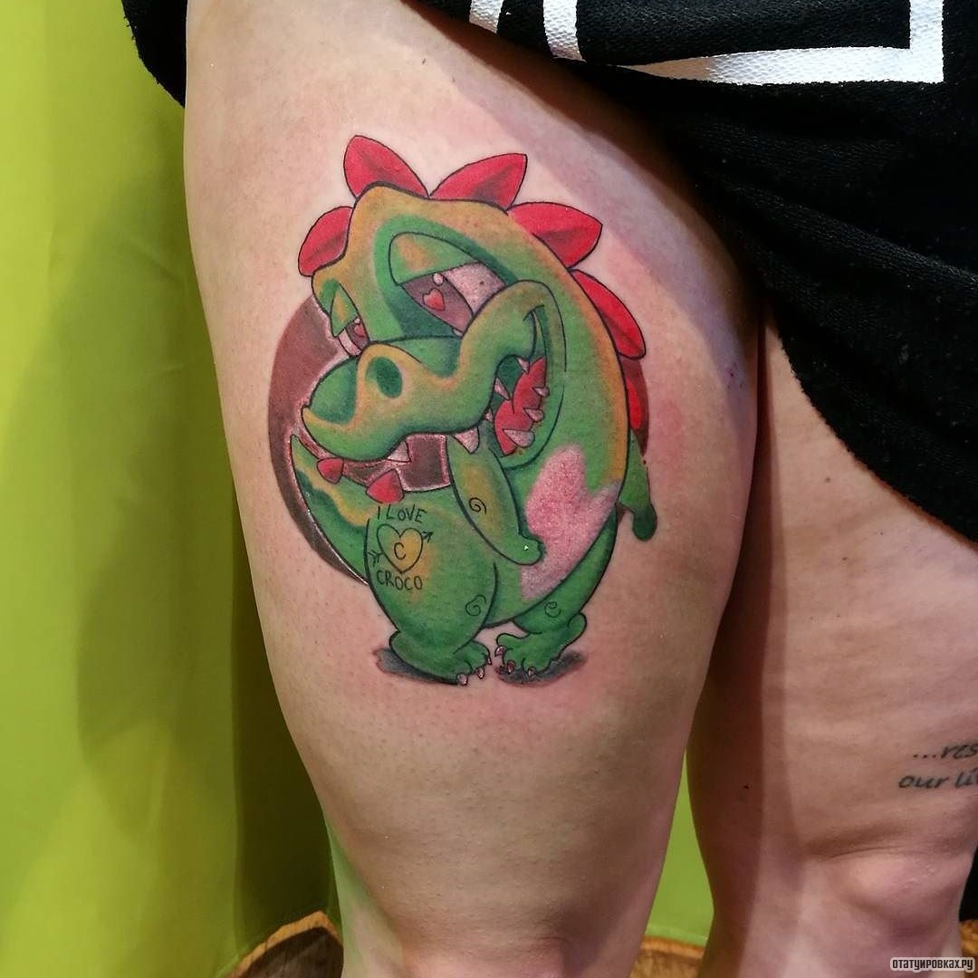 Фотография татуировки под названием «Милый зеленый мультяшный крокодил»
