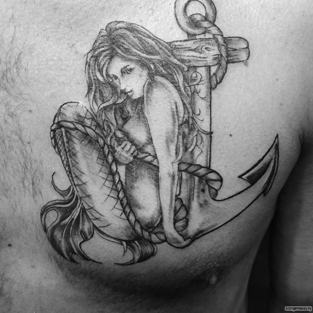 Фотография татуировки под названием «Русалка привязана к якорю»