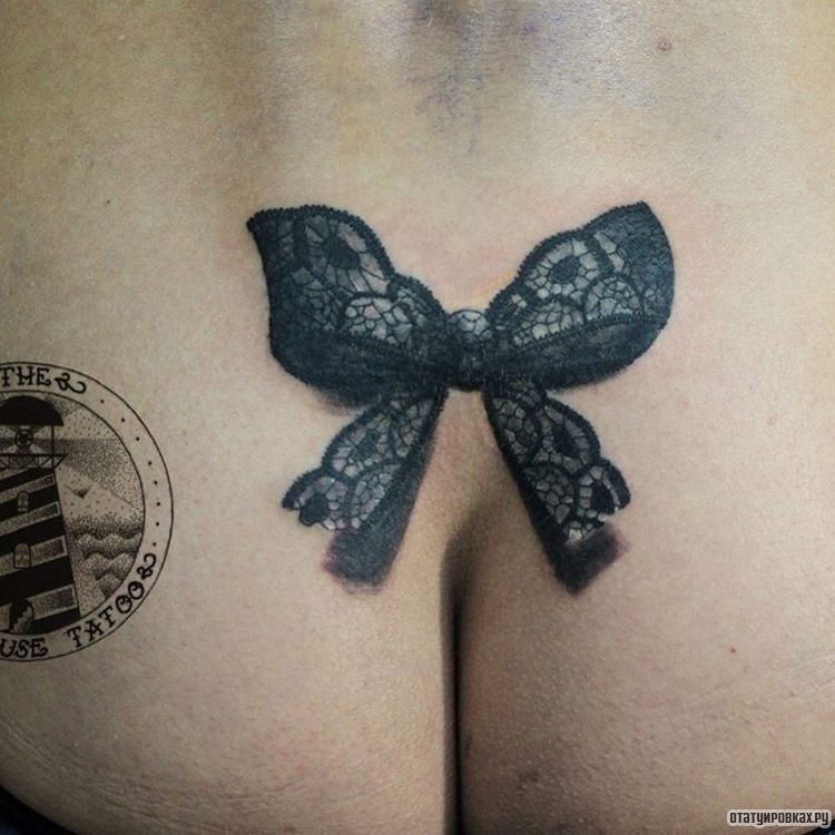 Фотография татуировки под названием «Бантик»