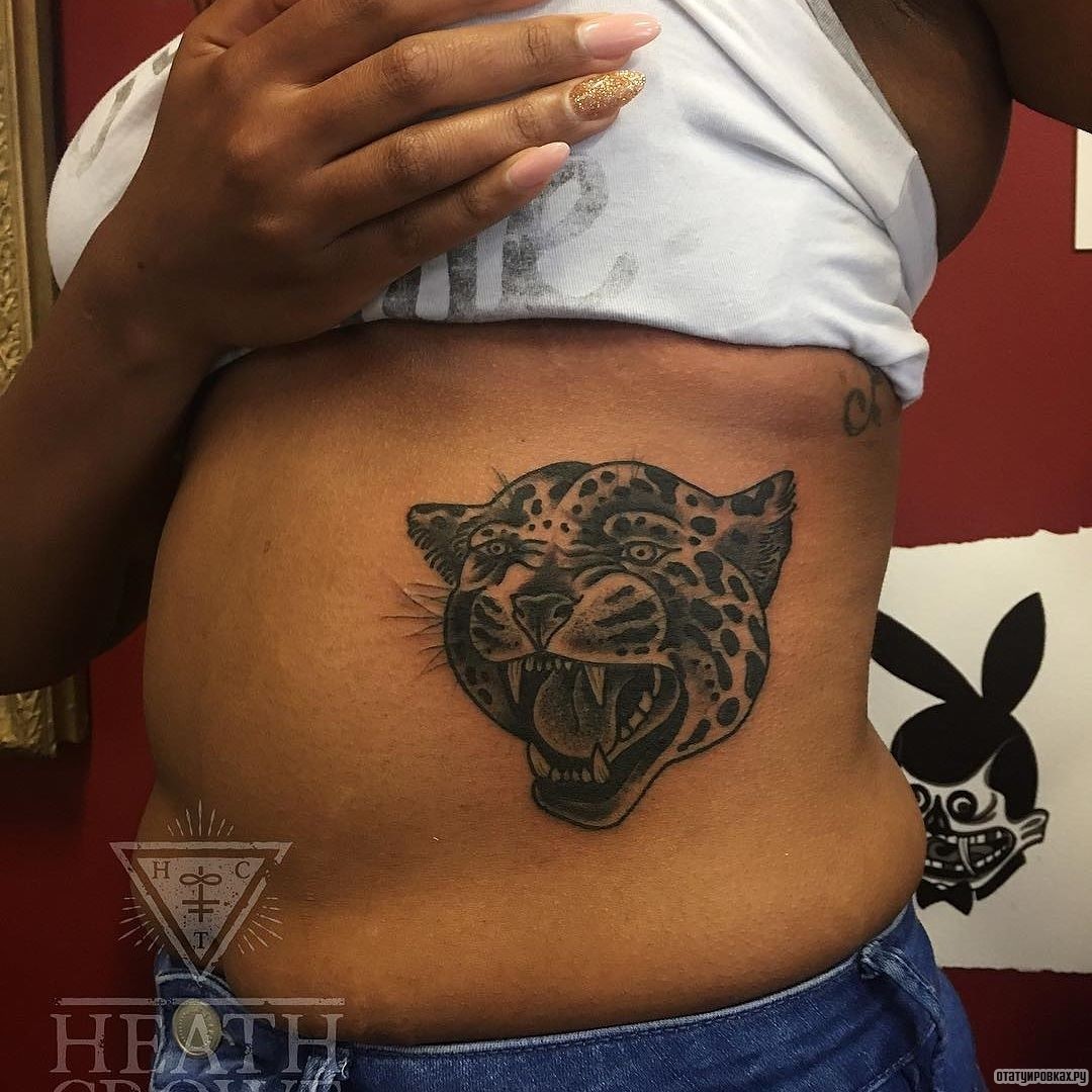 Фотография татуировки под названием «Оскал леопарда»