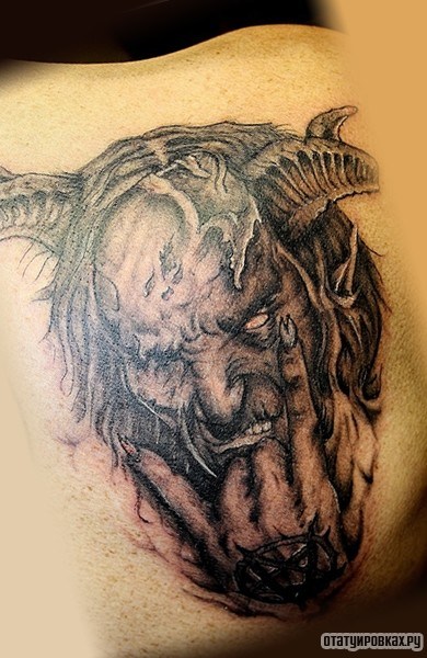 Фотография татуировки под названием «Демон рок»