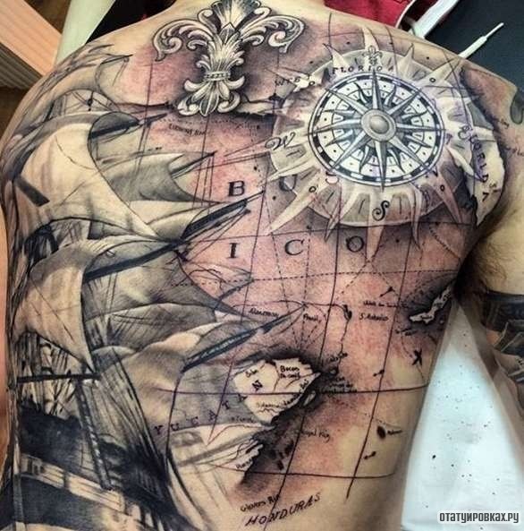Фотография татуировки под названием «Корабль со звездой и узорами»