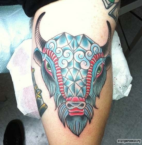 Фотография татуировки под названием «Морда быка»