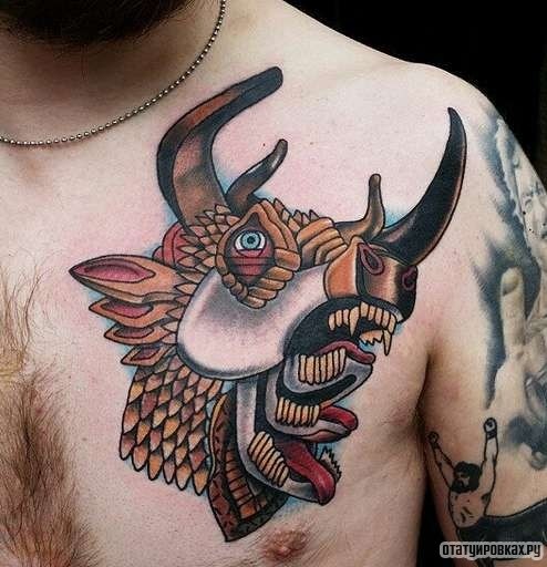 Фотография татуировки под названием «Бык с тремя ртами»