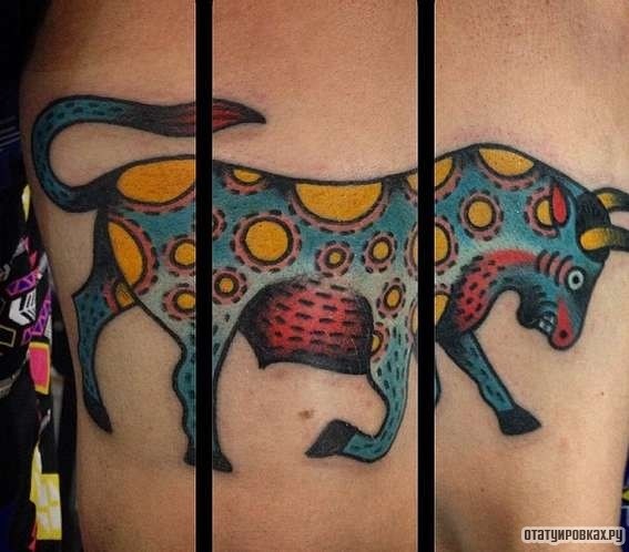 Фотография татуировки под названием «Бык с желтыми пятнами»