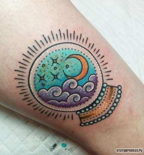 Фотография татуировки под названием «Узор с месяцем и звездами»