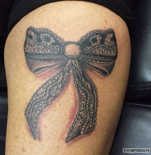 Фотография татуировки под названием «Бантик»