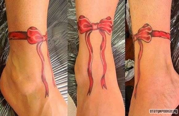 Фотография татуировки под названием «Бантик в красном цвете»