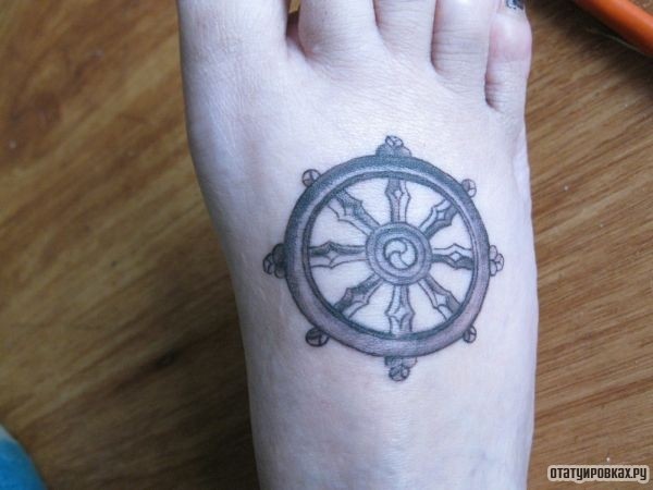 Татуировка колесо