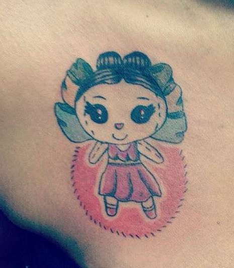 Оригинальная татуировка мультяшной девочки