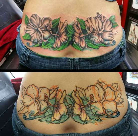 Красивые цветы в виде цветной татуировки на пояснице