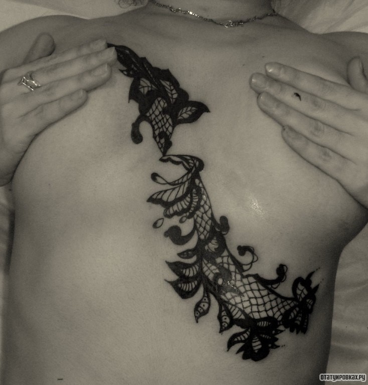 Фотография татуировки под названием «Узор на груди дешвуки»
