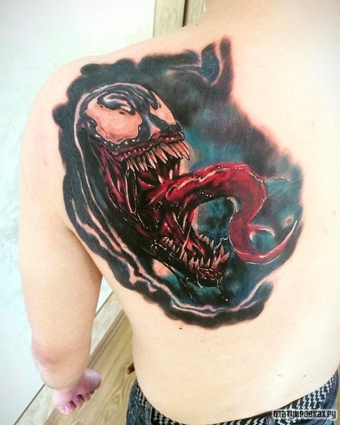 Фотография татуировки под названием «Чудовище с красным языком»