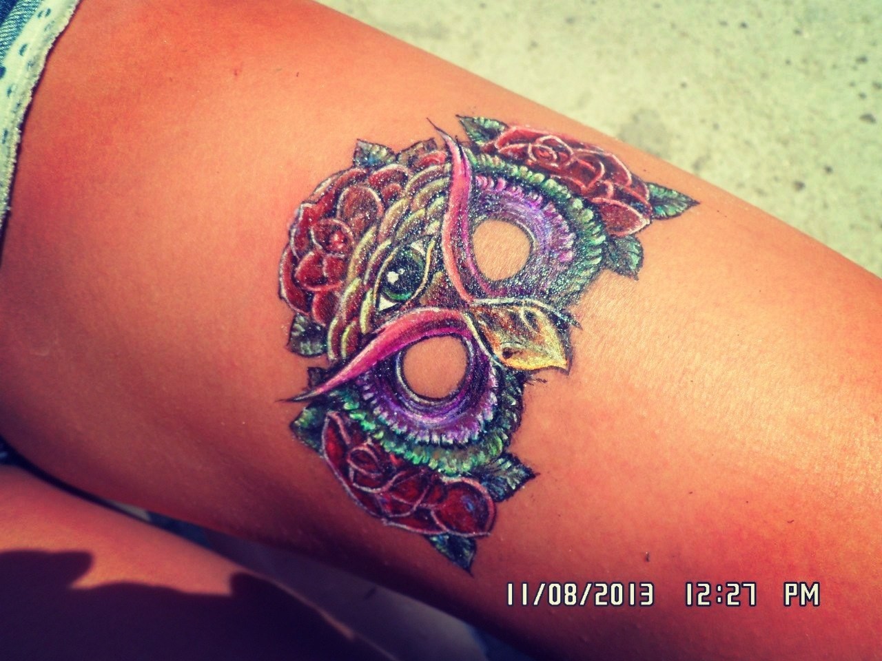 Фотография татуировки под названием «маска совы»