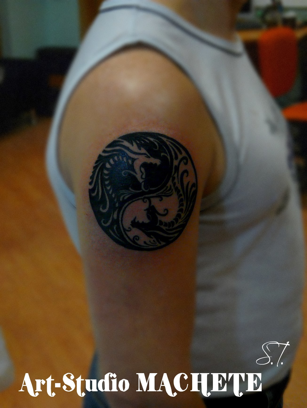 Фотография татуировки под названием «Драконы инь-янь»