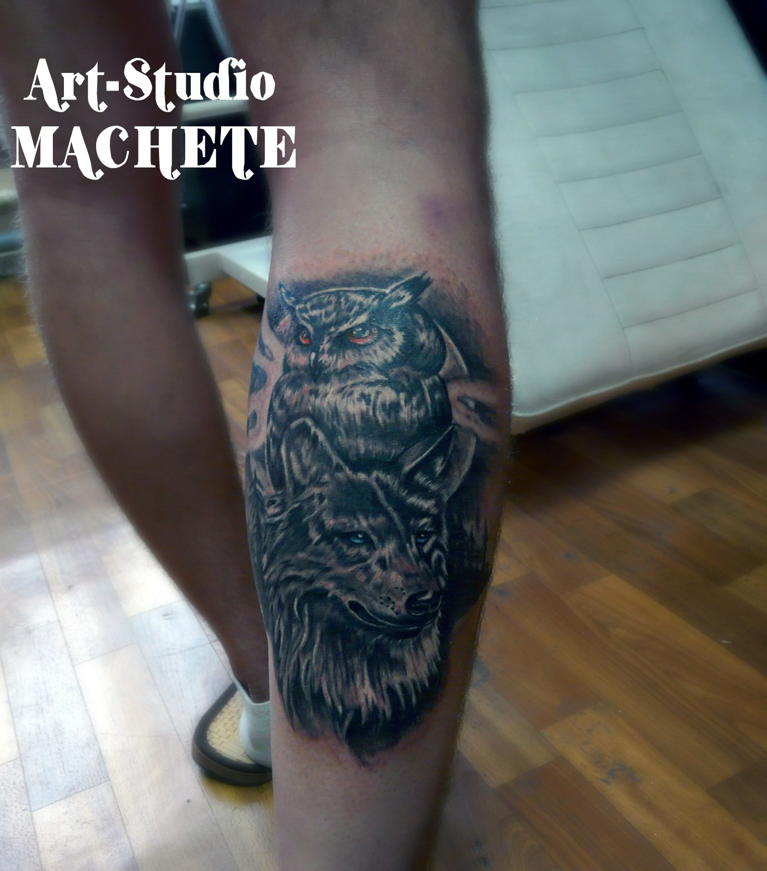 Фотография татуировки под названием «Сова и волк»