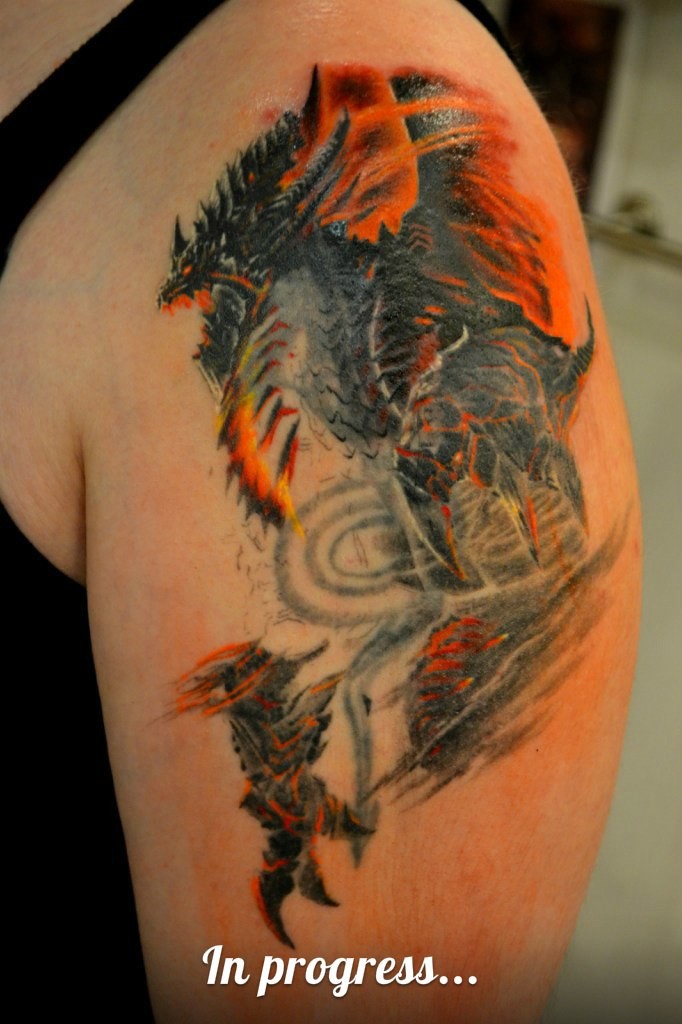 Фотография татуировки под названием «Дракон и вода»