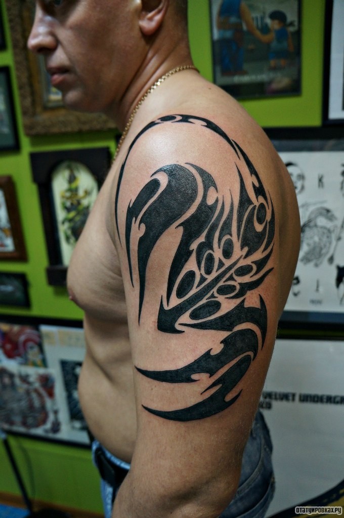 Фотография татуировки под названием «Трайбл узор»