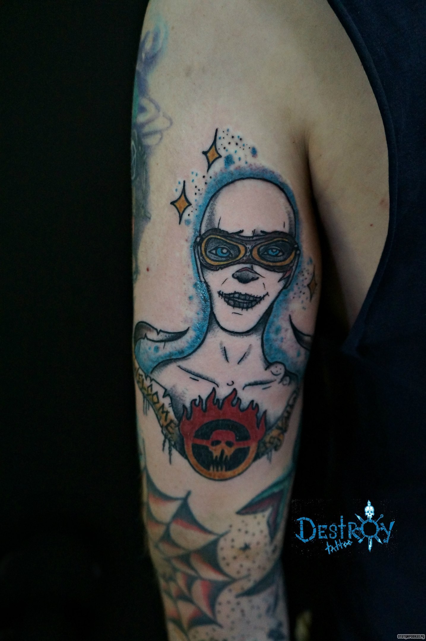 Фотография татуировки под названием «Лысый человек»