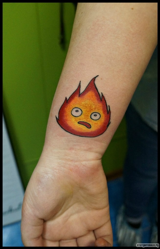 Фотография татуировки под названием «Огонек»