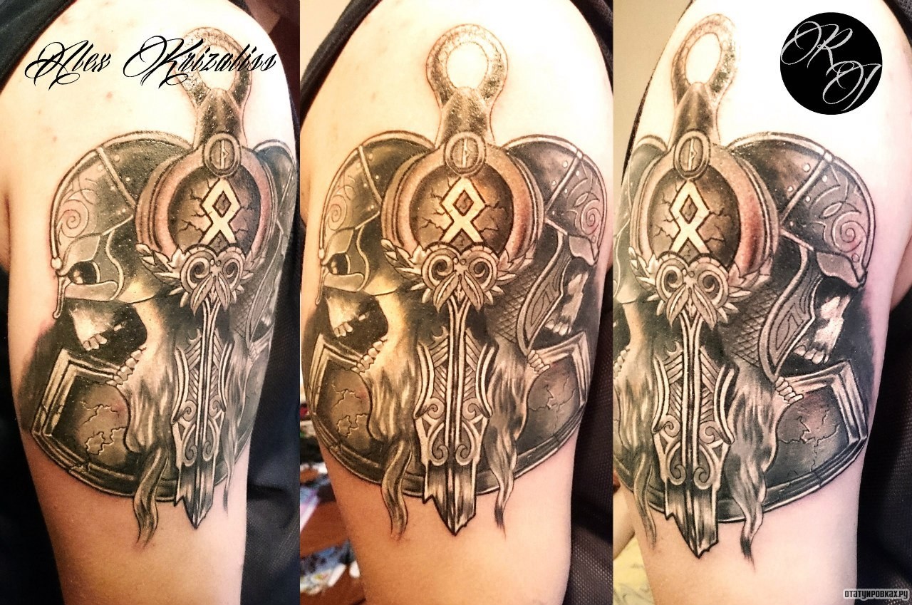 Фотография татуировки под названием «Дв черепа и меч»