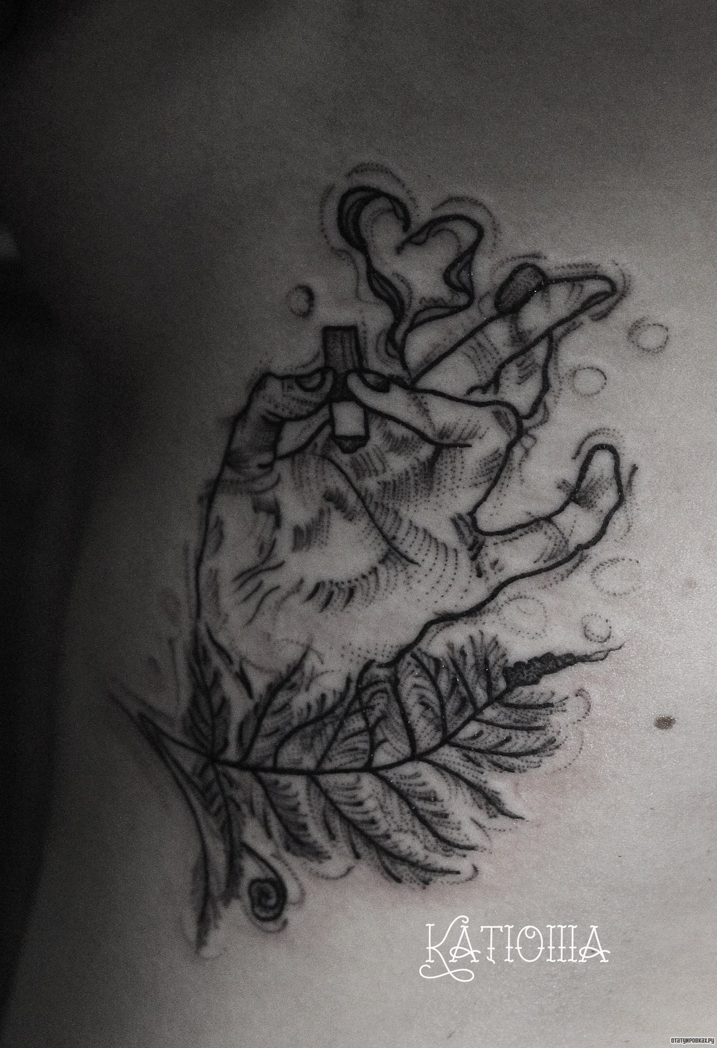 Фотография татуировки под названием «Рука с бычком»