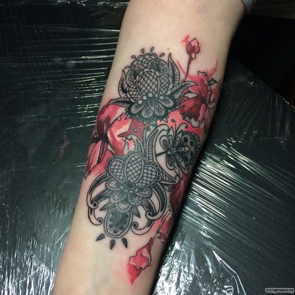 Фотография татуировки под названием «Цзоры цветы»