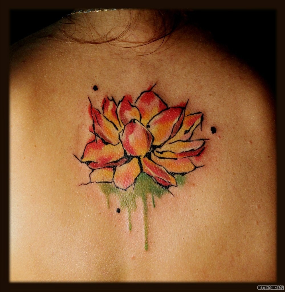 Фотография татуировки под названием «Цветок оранжевый»