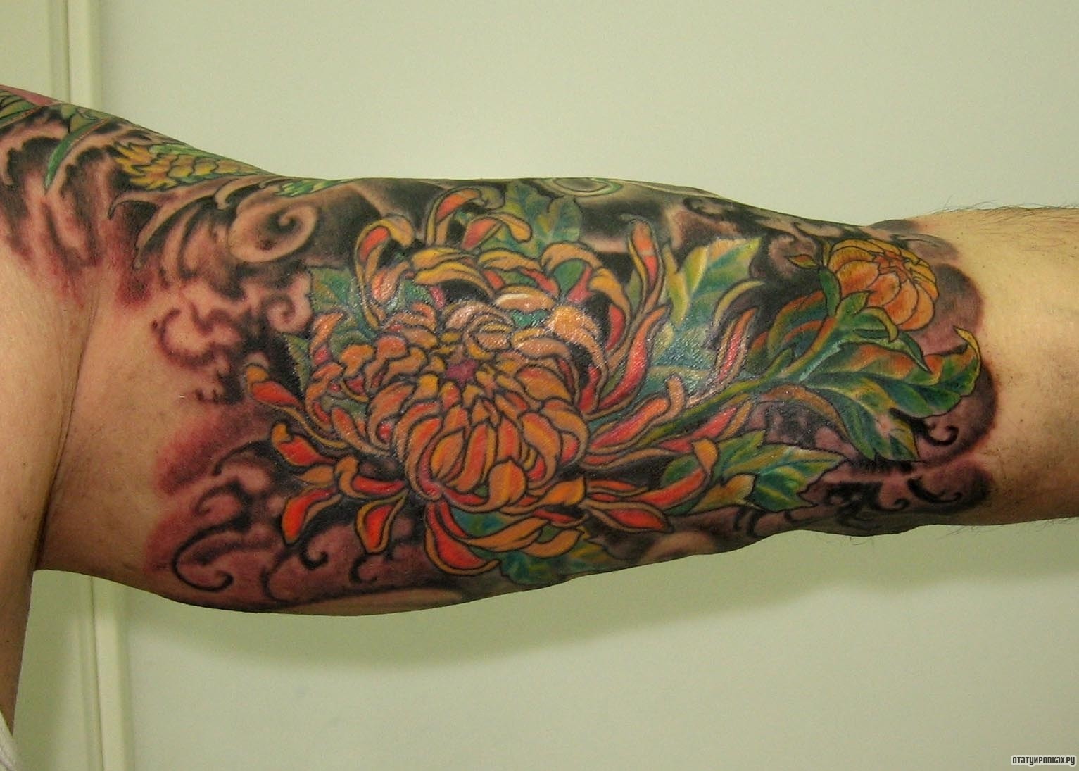 Фотография татуировки под названием «Цветок пиона»