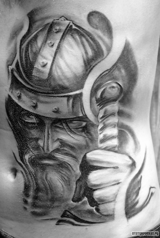 Фотография татуировки под названием «Голова воина»