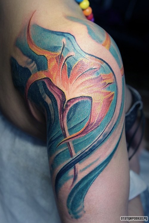 Фотография татуировки под названием «Оранжевый цветок»