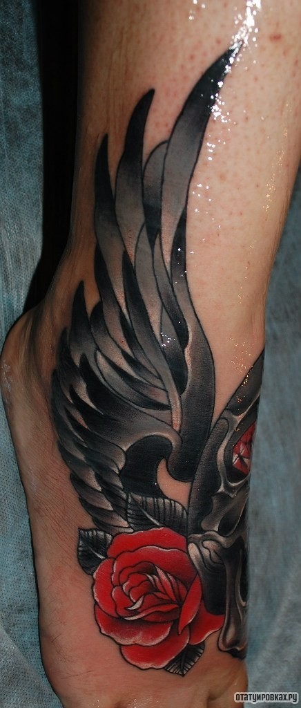 Фотография татуировки под названием «Роза с крыльями»