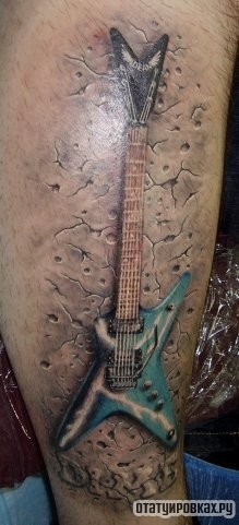 Фотография татуировки под названием «Электро гитара»