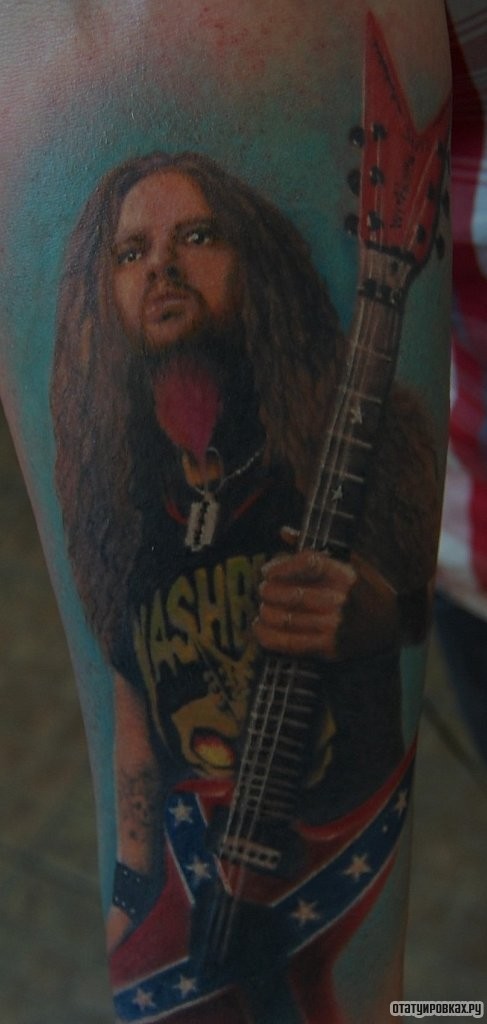 Фотография татуировки под названием «Гитарист»