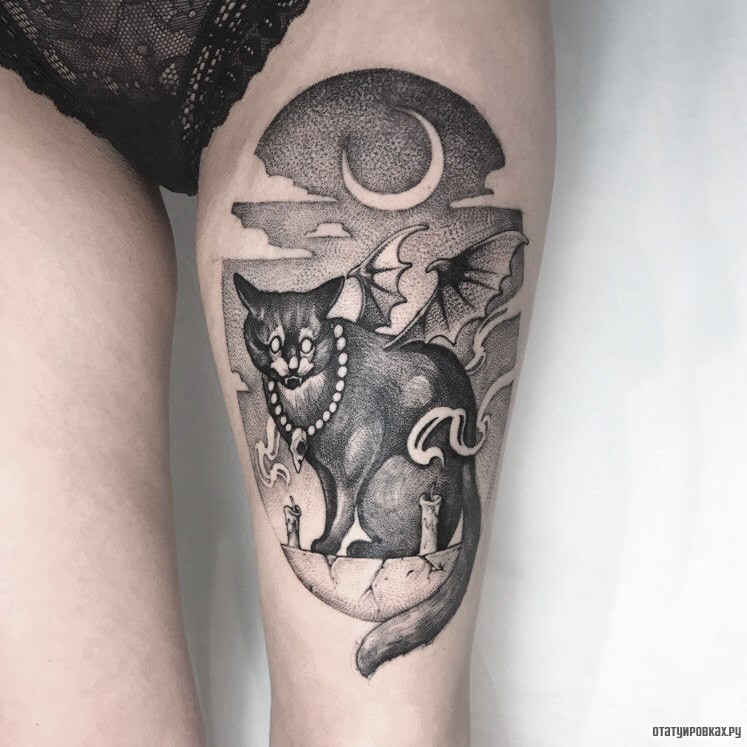 Фотография татуировки под названием «Кот с крыльями летучей мыши»